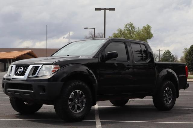 used 2014 Nissan Frontier car, priced at $15,999