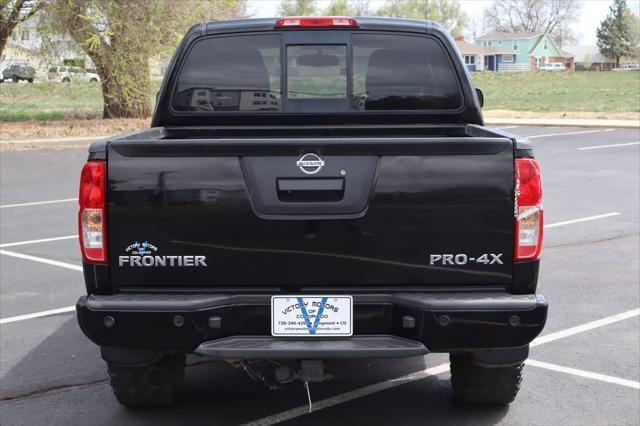 used 2014 Nissan Frontier car, priced at $15,999