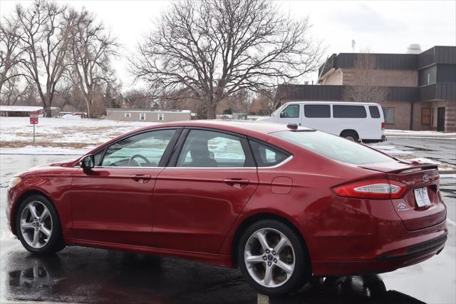 used 2015 Ford Fusion car, priced at $9,999