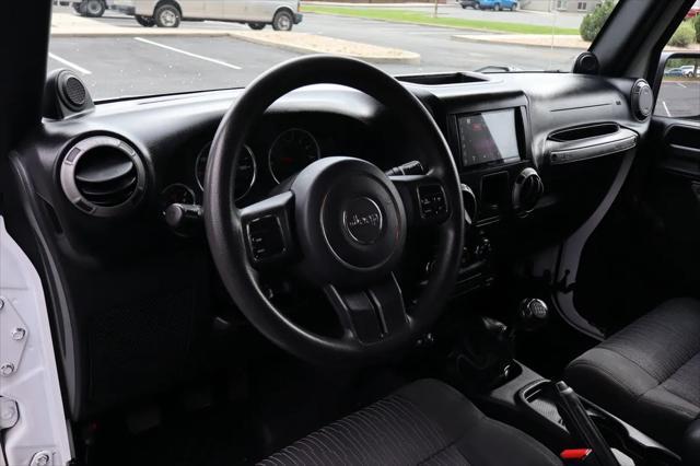 used 2011 Jeep Wrangler car, priced at $13,999