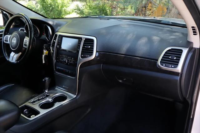 used 2011 Jeep Grand Cherokee car, priced at $9,999
