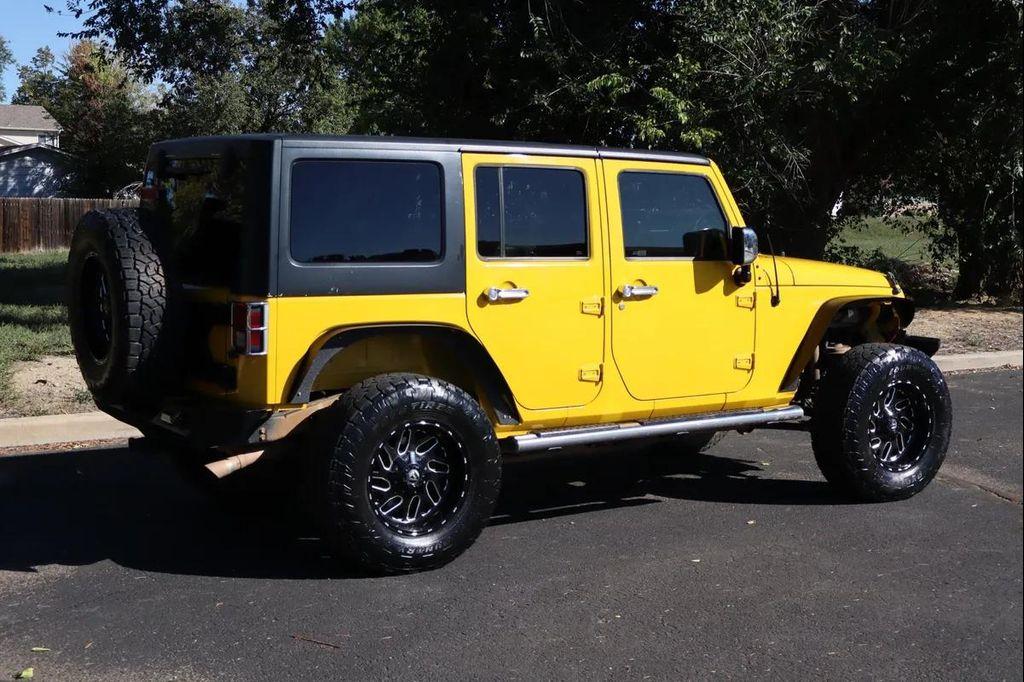 used 2011 Jeep Wrangler Unlimited car, priced at $13,999