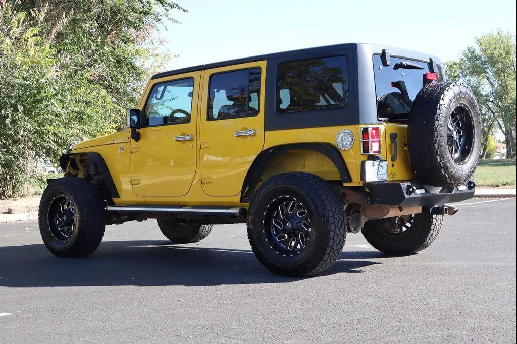 used 2011 Jeep Wrangler Unlimited car, priced at $13,999