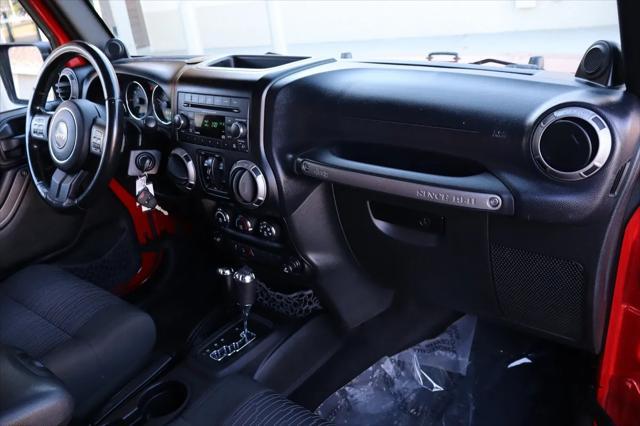 used 2012 Jeep Wrangler Unlimited car, priced at $12,999