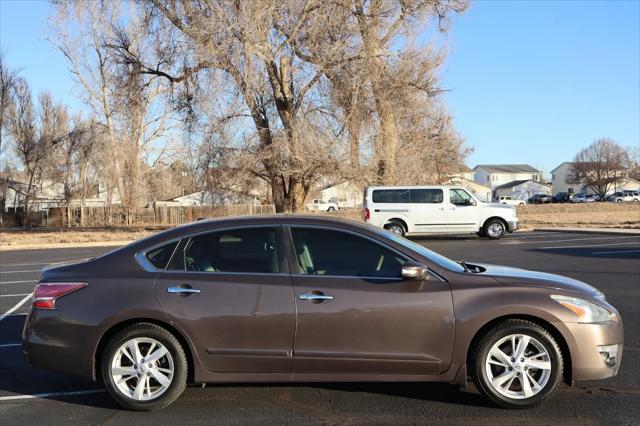 used 2015 Nissan Altima car, priced at $7,999