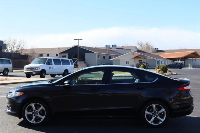 used 2016 Ford Fusion car, priced at $12,999