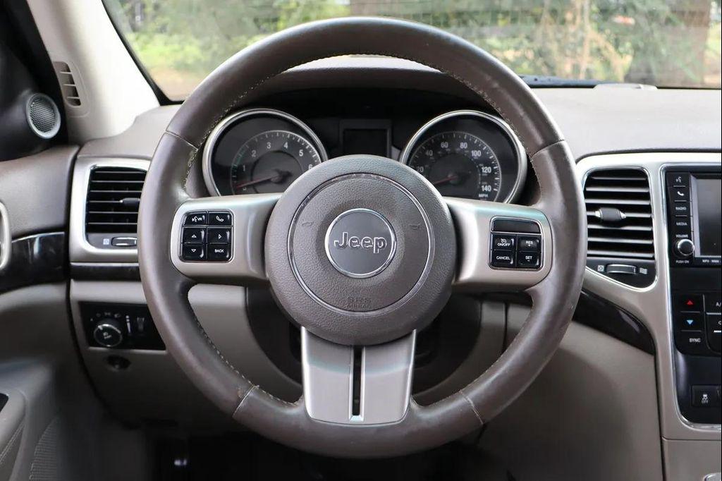 used 2011 Jeep Grand Cherokee car, priced at $8,999