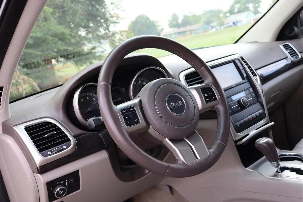 used 2011 Jeep Grand Cherokee car, priced at $8,999