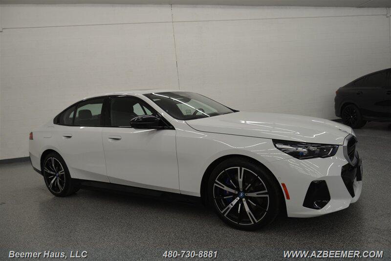 used 2024 BMW i5 car, priced at $59,998
