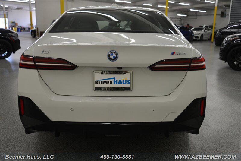 used 2024 BMW i5 car, priced at $59,998