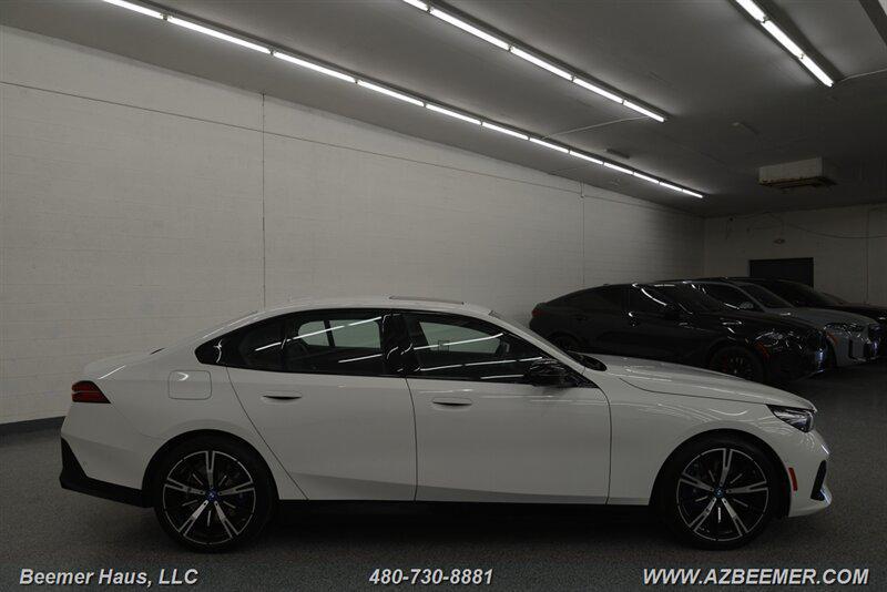 used 2024 BMW i5 car, priced at $59,998
