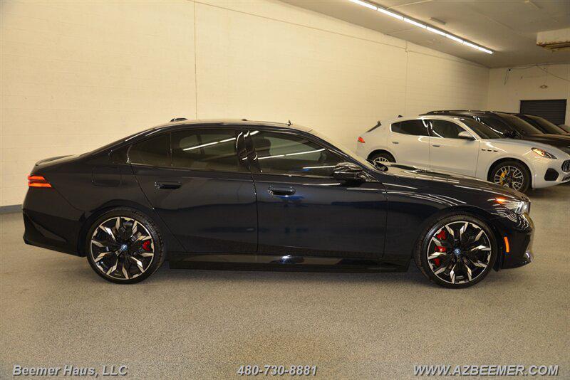 used 2024 BMW i5 car, priced at $58,998