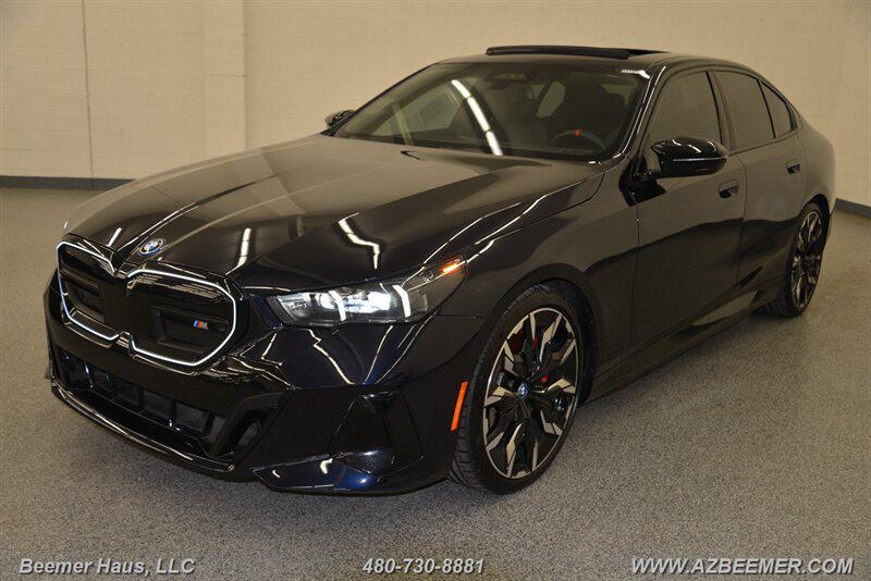 used 2024 BMW i5 car, priced at $58,998