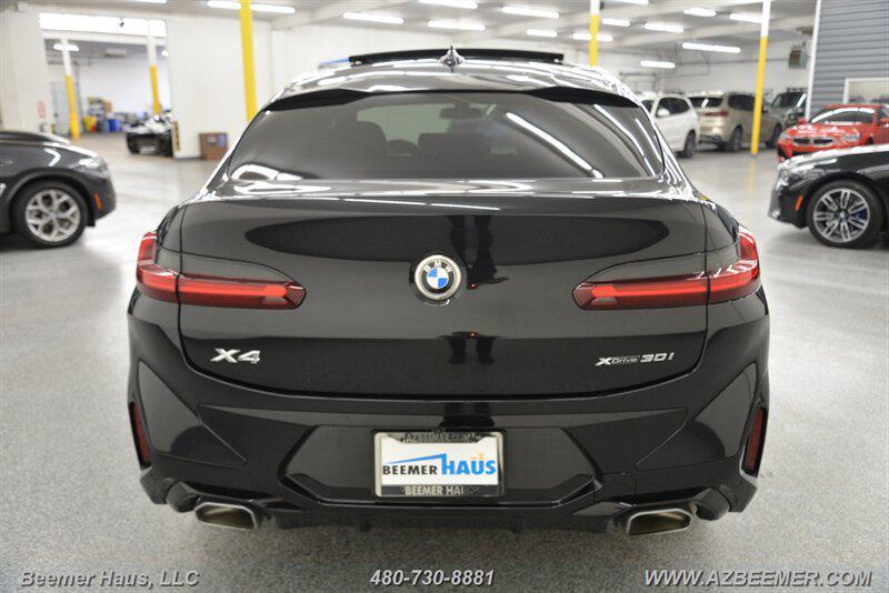used 2025 BMW X4 car, priced at $55,998