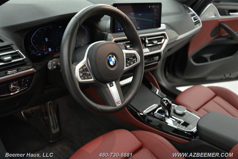 used 2025 BMW X4 car, priced at $55,998