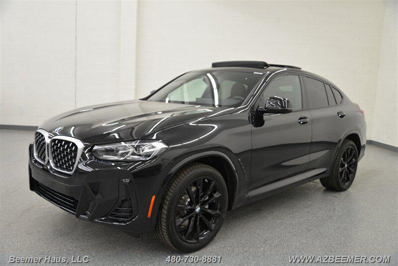 used 2025 BMW X4 car, priced at $55,998