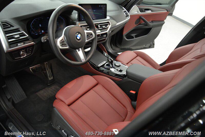 used 2025 BMW X4 car, priced at $55,998