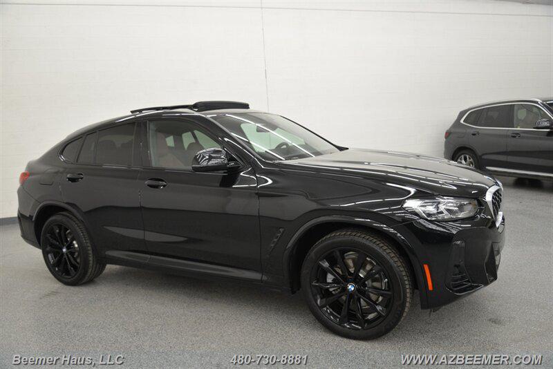 used 2025 BMW X4 car, priced at $55,998