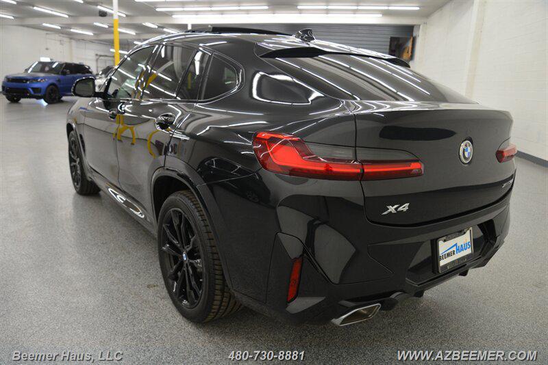 used 2025 BMW X4 car, priced at $55,998