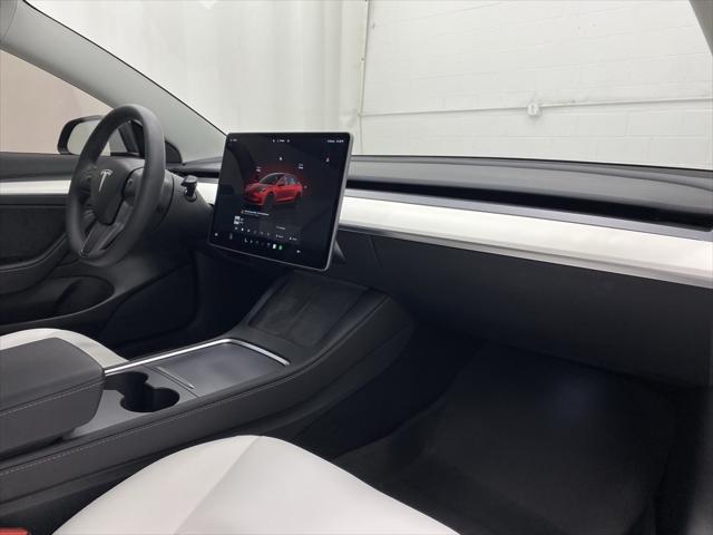 used 2023 Tesla Model 3 car, priced at $33,778