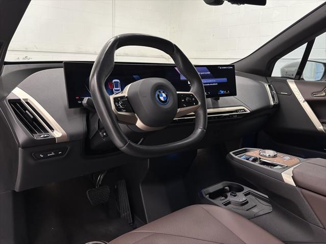 used 2024 BMW iX car, priced at $54,877