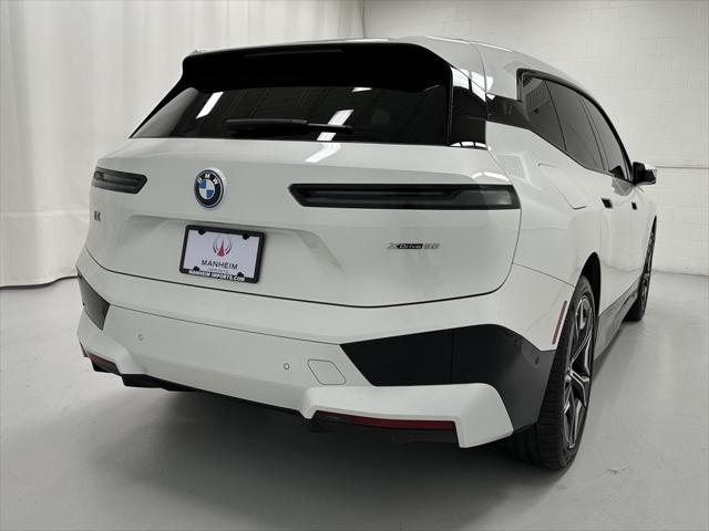 used 2024 BMW iX car, priced at $54,877