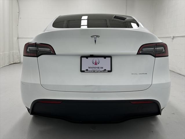 used 2023 Tesla Model Y car, priced at $32,877