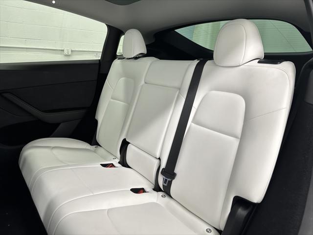 used 2023 Tesla Model Y car, priced at $32,877