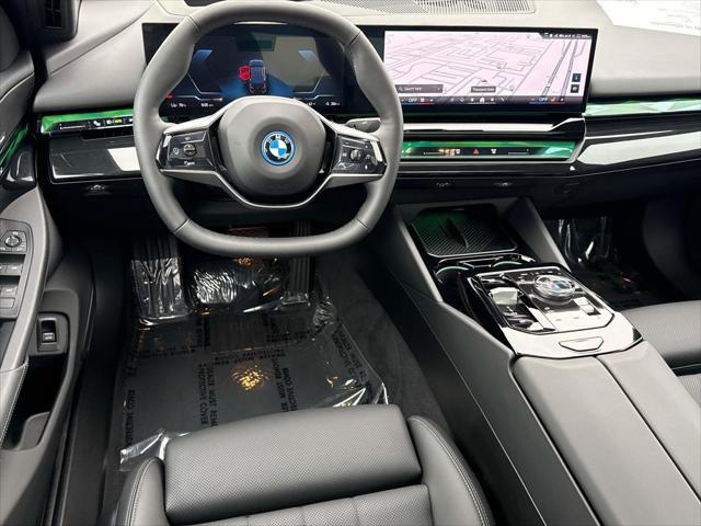 used 2024 BMW i5 car, priced at $62,795