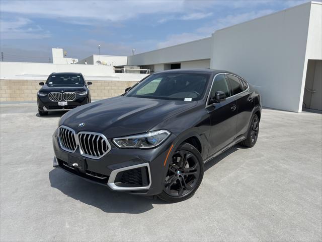 used 2022 BMW X6 car, priced at $54,411