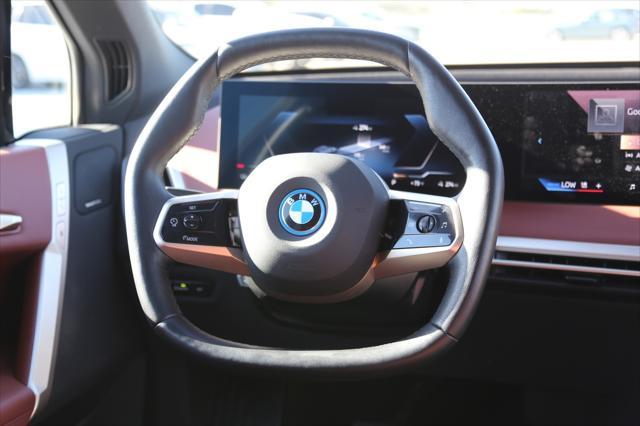 used 2024 BMW iX car, priced at $69,911