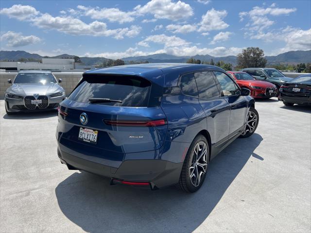 used 2022 BMW iX car, priced at $48,911