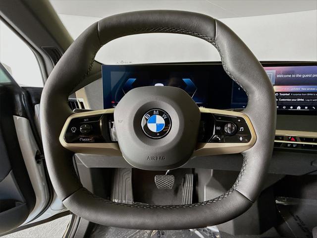 new 2026 BMW iX car, priced at $92,620