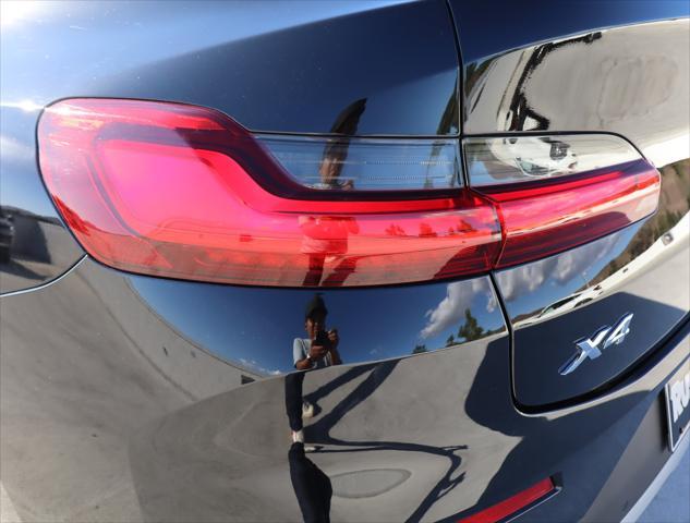 used 2022 BMW X4 car, priced at $39,911