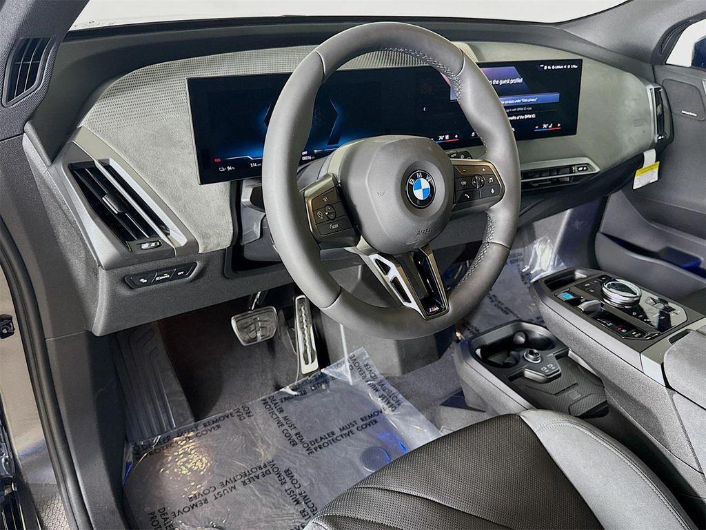 new 2026 BMW iX car, priced at $102,770