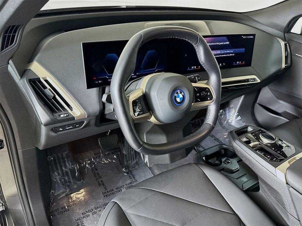 used 2024 BMW iX car, priced at $56,911