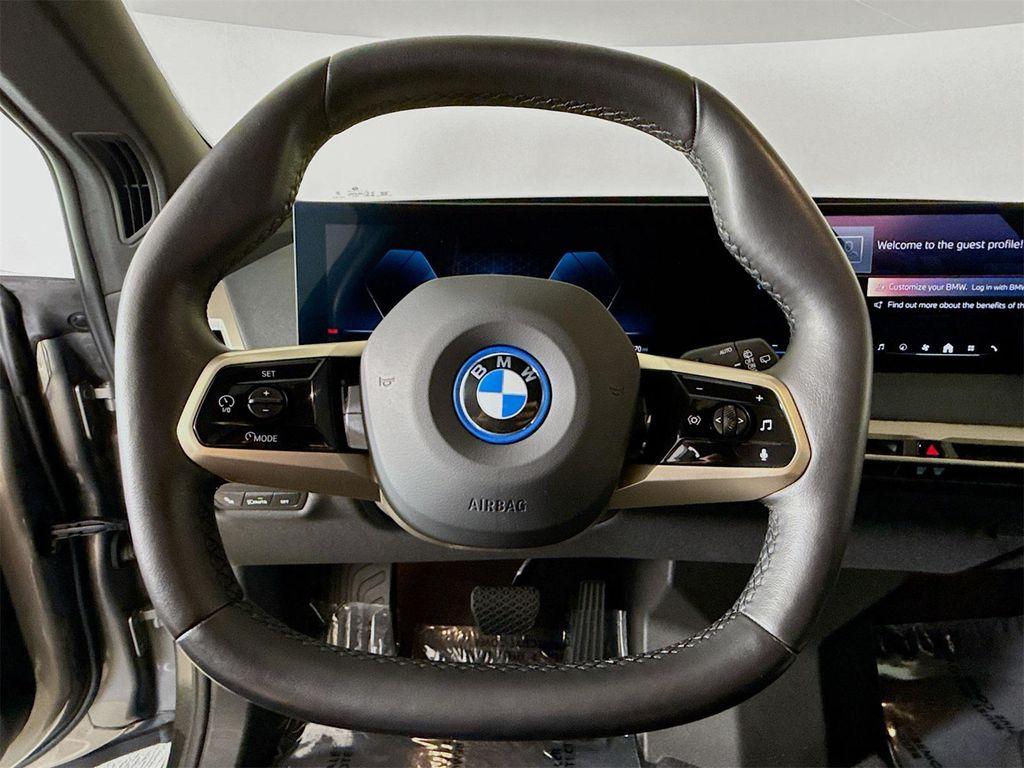 used 2024 BMW iX car, priced at $56,911