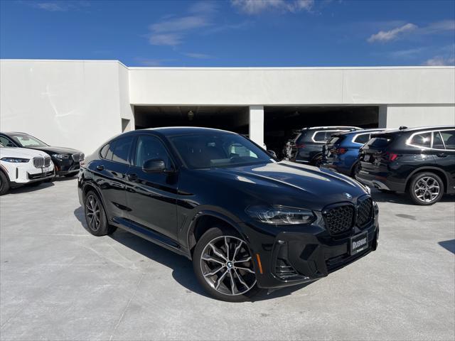 used 2023 BMW X4 car, priced at $45,911