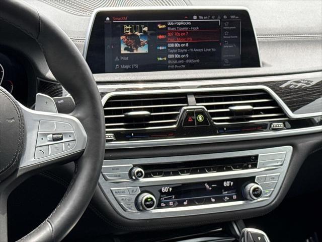 used 2022 BMW 740 car, priced at $49,911