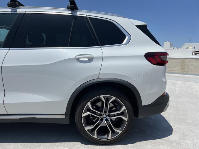 used 2023 BMW X5 car, priced at $52,911