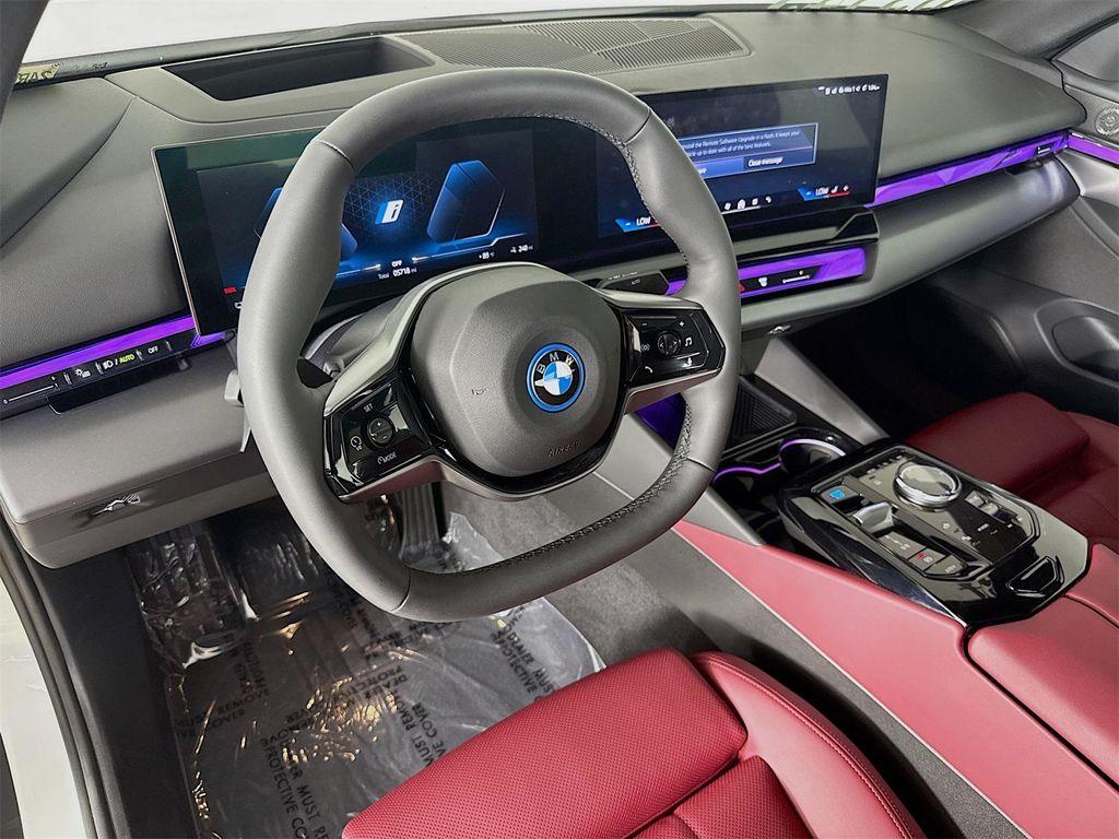 used 2024 BMW i5 car, priced at $62,145