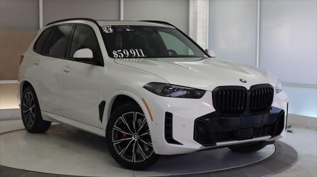 used 2024 BMW X5 car, priced at $57,911