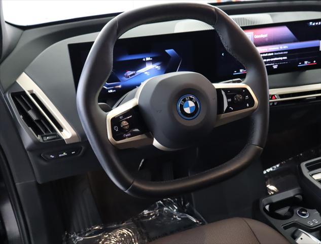 used 2022 BMW iX car, priced at $56,911