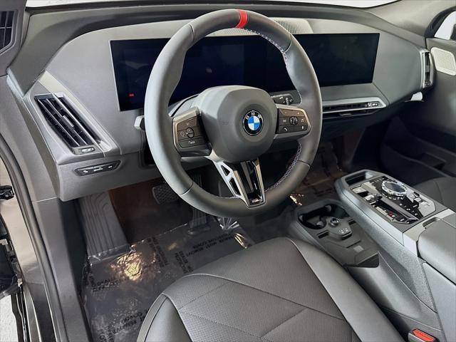 new 2025 BMW iX car, priced at $117,225
