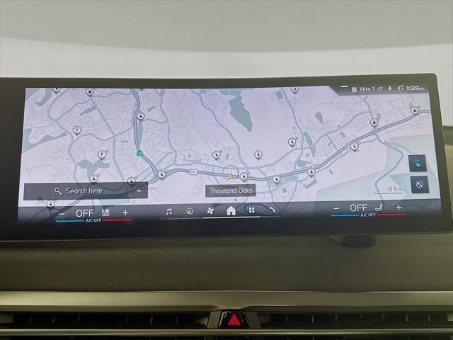 new 2025 BMW iX car, priced at $117,225
