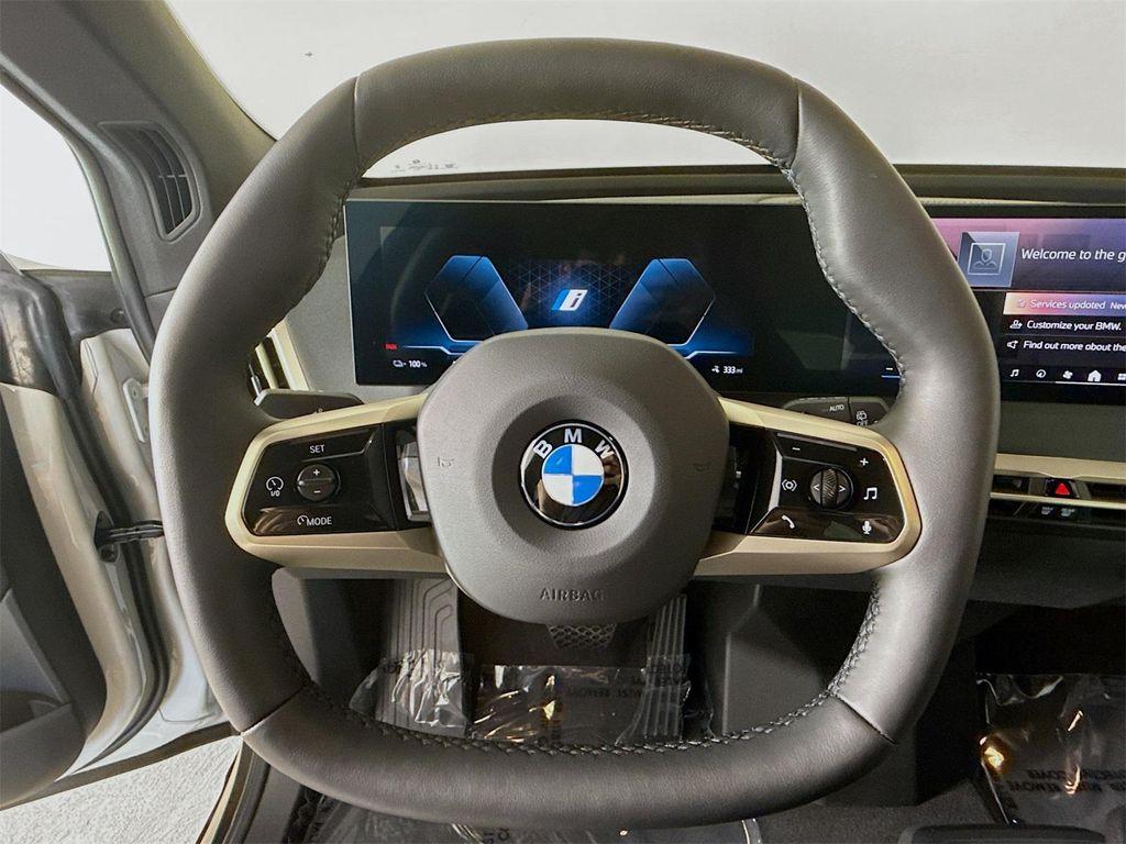 new 2026 BMW iX car, priced at $92,570