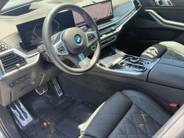 used 2024 BMW X5 PHEV car, priced at $72,911