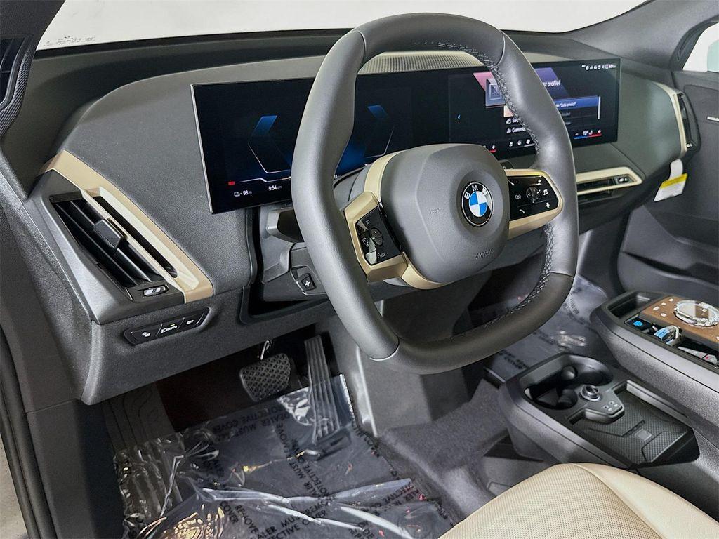 new 2026 BMW iX car, priced at $84,820