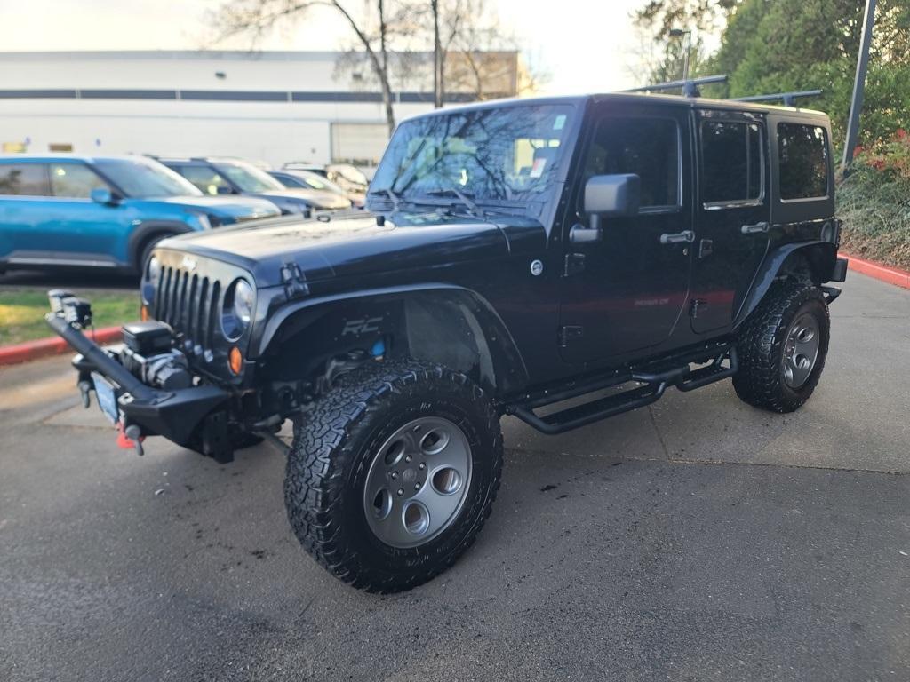 used 2013 Jeep Wrangler Unlimited car, priced at $14,799