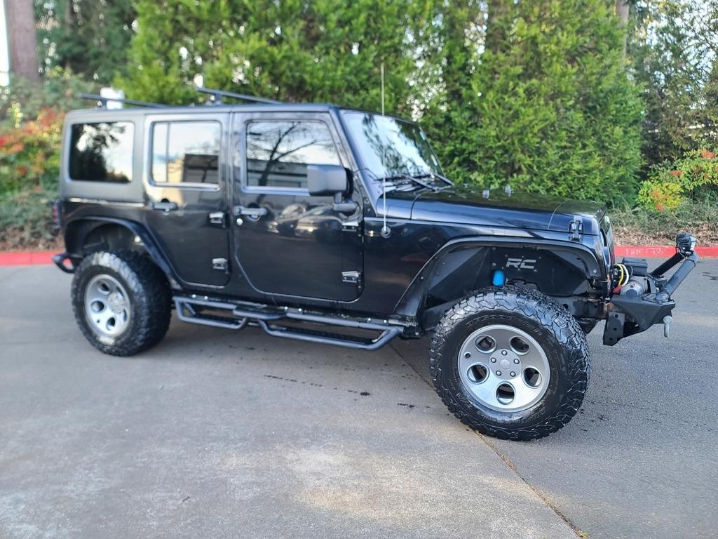 used 2013 Jeep Wrangler Unlimited car, priced at $14,799